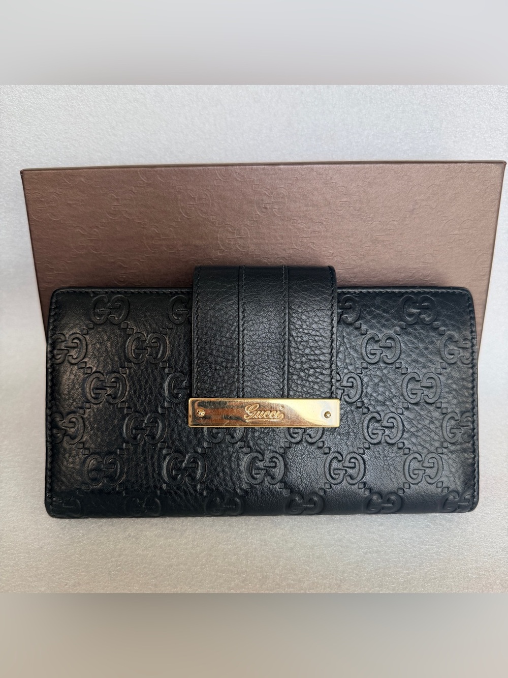 Gucci Black Leather GG-Embossed Wallet with Gold Nameplate